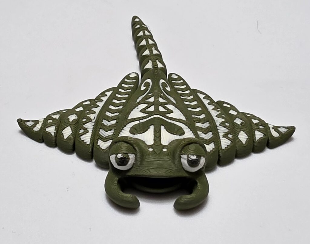 Photo of 3D printed flexi tattooed manta ray mini in green and white