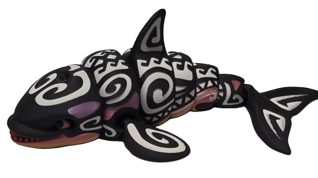 Photo of 3D printed flexi tattooed orca
